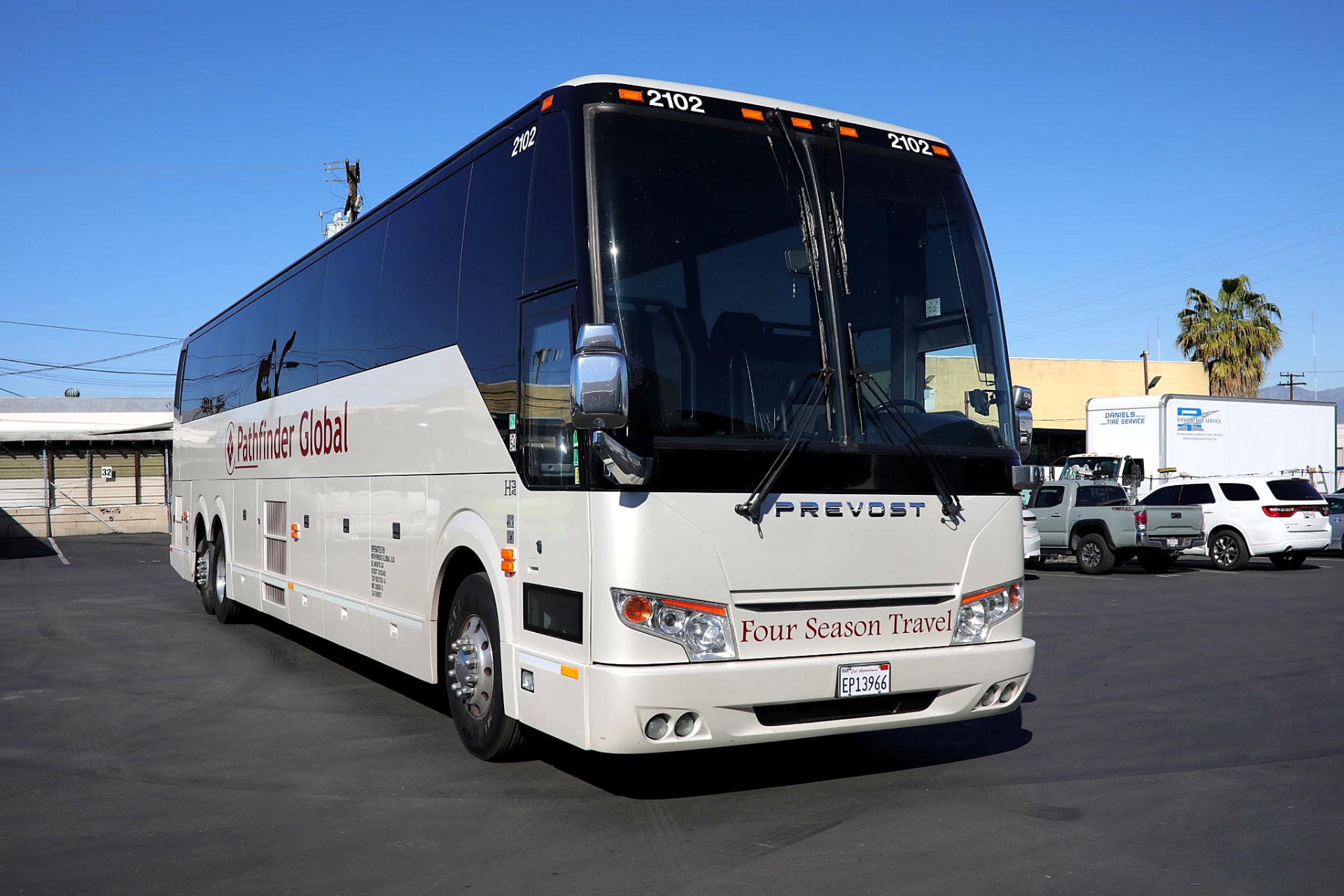 Four Season Travel motorcoach photographed in full side profile before going into service