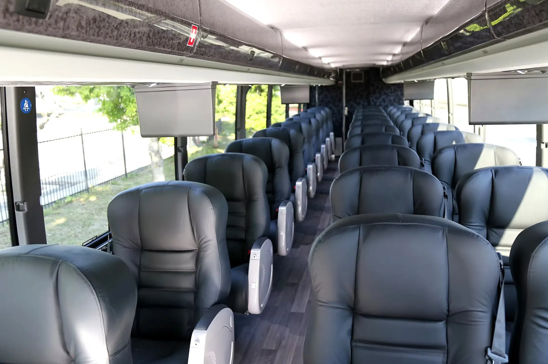 Alternate wide interior view of the Four Season Travel VIP coach cabin